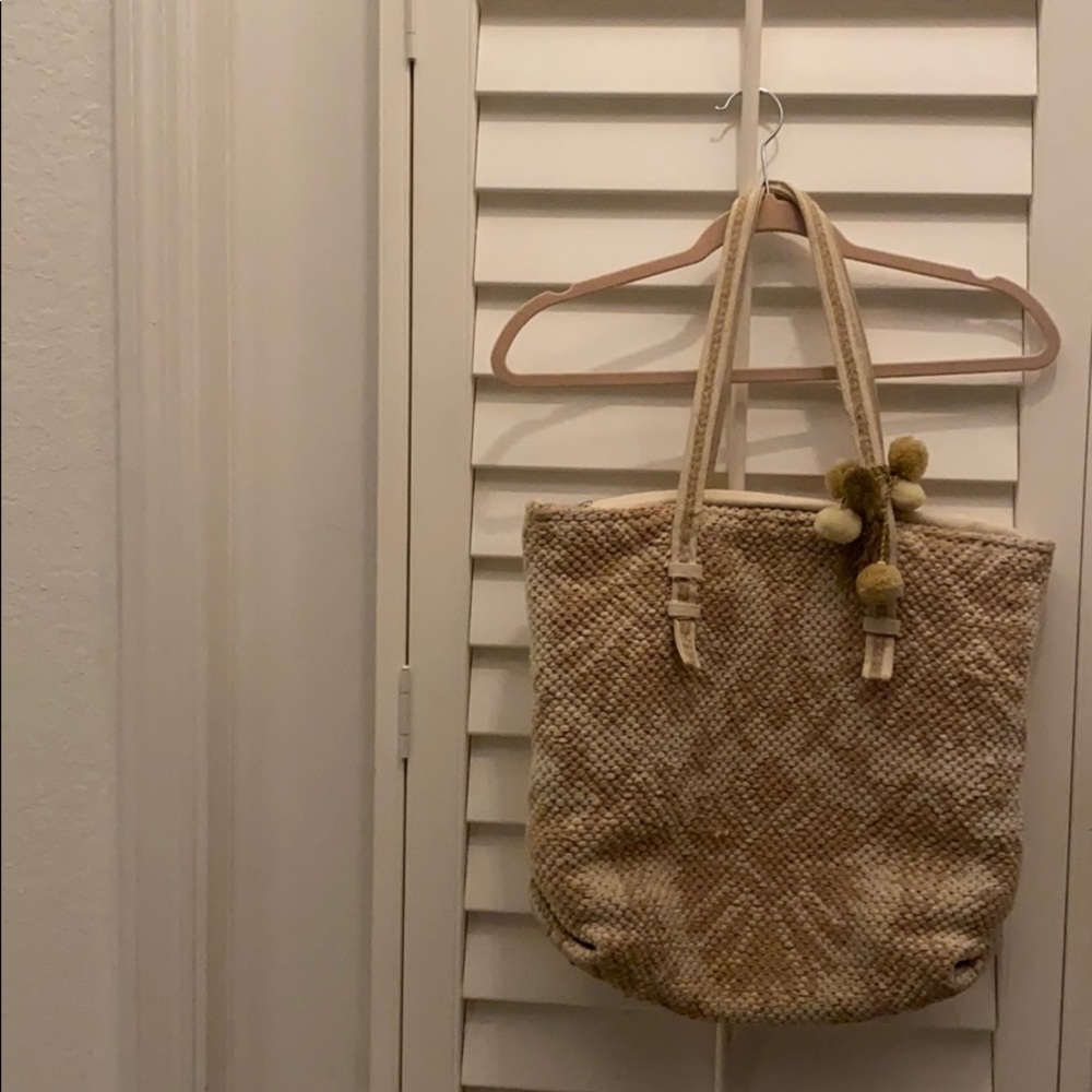America & Beyond nude tapestry bag